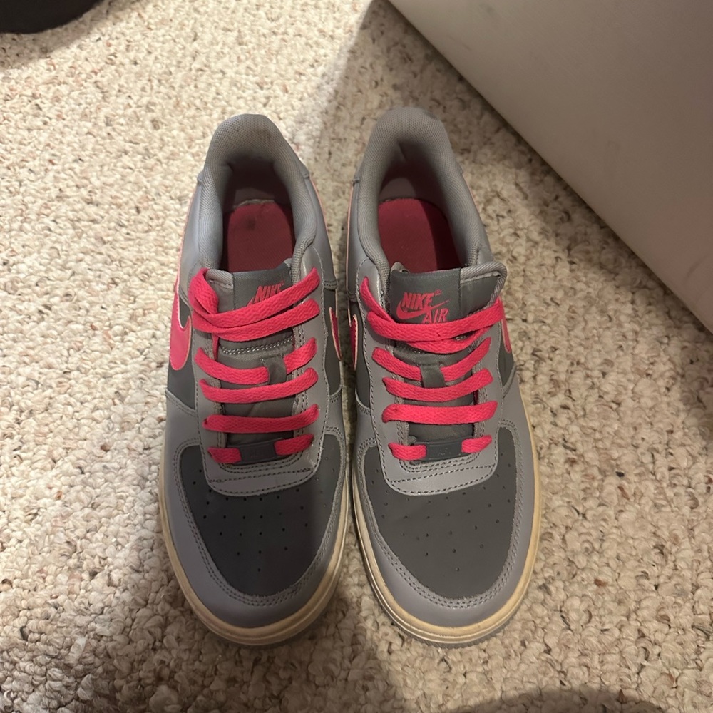 Gray and pink Nike Air size 6.5